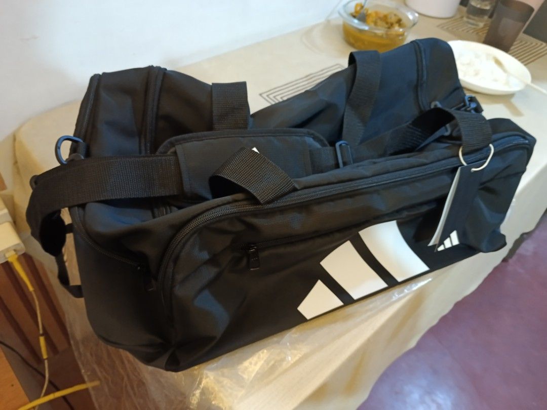 Adidas Training Defiant Duffel Bag Medium Black (Category: Sling Bags) located in Manila. Submitted by jhurramire25082 (Listing ID 1469997885, Image 2). Description: 100% orig. duffle bag adidas brandnew ,kakabili lng. rfs: mali ng nabili srp: 2,900 Now: 2k nlng pra sa mahihilig gumala pdeng pde sayo to - Brand: Adidas - Color: Black with big white logo - Size: Medium - Condition: Brand new with original tag (PHP 2,900 retail price) and packaging