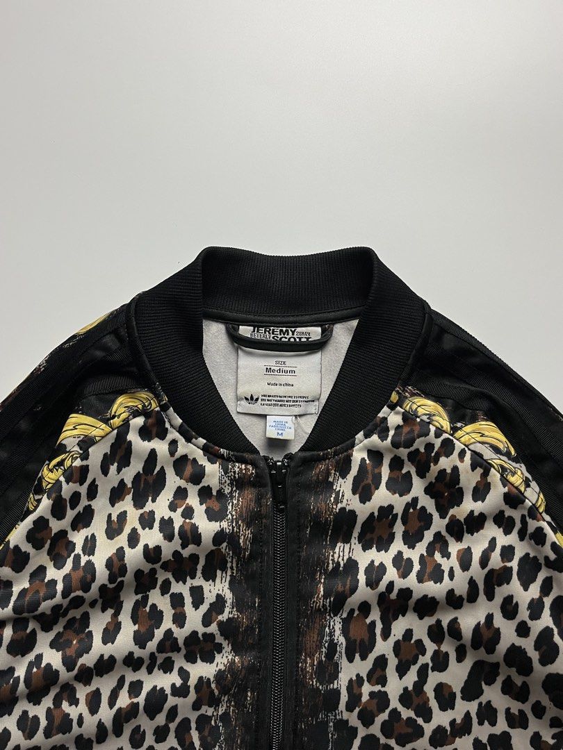Adidas x Jeremy Scott Leopard Cherub Track Jacket (Category: Coats, Jackets and Outerwear) located in Manila. Submitted by streetsavvy (Listing ID 1470050381, Image 3). Description: Adidas x Jeremy Scott Leopard Cherub Track Jacket Size: Medium Width: 18” Length: 24” Hem: 15” Measured in Inches Condition: Excellent condition Made in China.