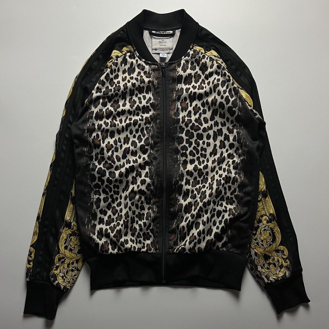 Adidas x Jeremy Scott Leopard Cherub Track Jacket (Category: Coats, Jackets and Outerwear) located in Manila. Submitted by streetsavvy (Listing ID 1470050381, Image 1). Description: Adidas x Jeremy Scott Leopard Cherub Track Jacket Size: Medium Width: 18” Length: 24” Hem: 15” Measured in Inches Condition: Excellent condition Made in China.