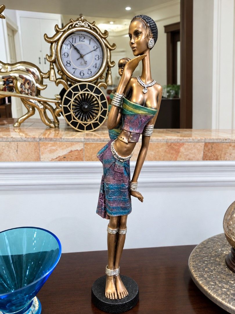 African figurine (Category: Other Home Decor) located in Makati City. Submitted by monicaelise (Listing ID 1470082493, Image 1). Description: in perfect condition 18 inches tall.