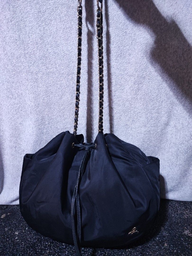Agnès b. black nylon draw string shoulder bag (Category: Shoulder Bags) located in Baguio. Submitted by jayrgijc52758 (Listing ID 1470089898, Image 1). Description: Agnes B. Long strap shoulder bag Medium near large Very nice nito In very good condition 680.