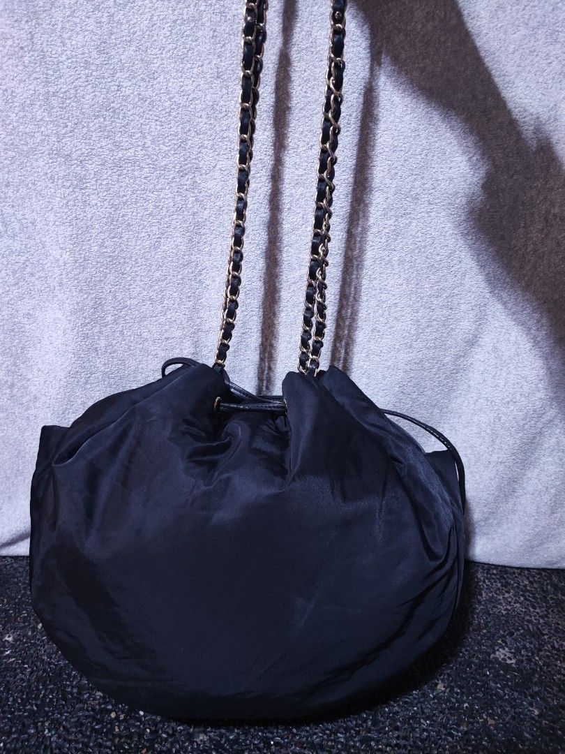 Agnès b. black nylon draw string shoulder bag (Category: Shoulder Bags) located in Baguio. Submitted by jayrgijc52758 (Listing ID 1470089898, Image 2). Description: Agnes B. Long strap shoulder bag Medium near large Very nice nito In very good condition 680.