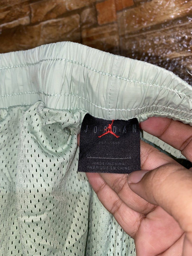 AIR JORDAN ESSENTAILS WOVEN SHORTS (Category: Shorts) located in Cebu City. Submitted by arsenyong (Listing ID 1469965145, Image 2). Description: Waist:28-34 Length :19 Hem:12 Excellent Need wash only.
