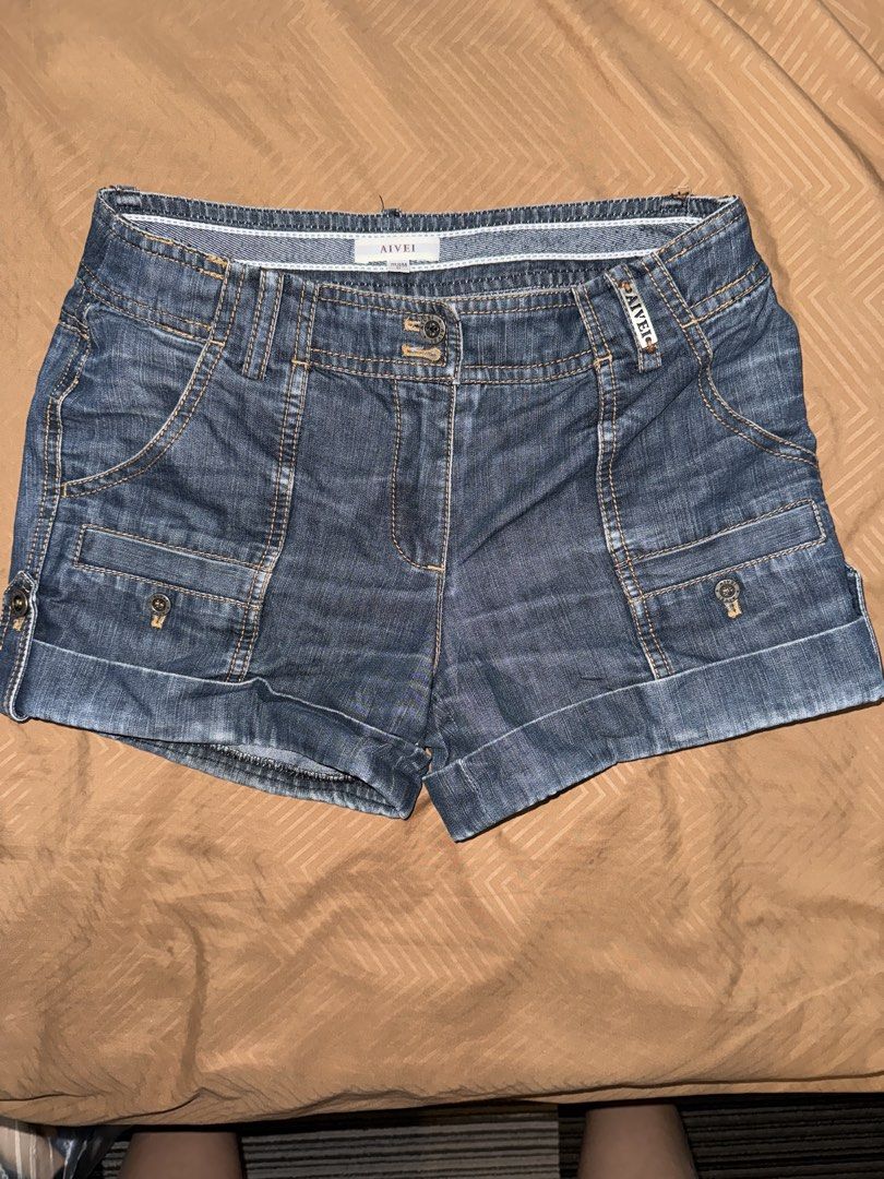 AIVEI Blue Denim Cuffed Shorts (Category: Shorts) located in Taytay. Submitted by favorednfound (Listing ID 1469949483, Image 1). Description: size: 25-26 includes multiple cargo-style pockets with button details on the front and back - Mode of Payment: Online Bank or GCash.