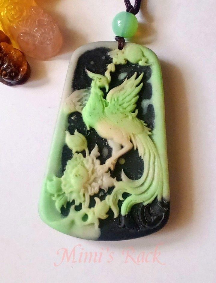 Ambergris Phoenix & Peony Pendant Necklace (Category: Necklaces) located in Taguig. Submitted by mimisrack (Listing ID 1470109037, Image 2). Description: 💚🛡️ Protection & Good Fortune — ambergris is traditionally associated in some spiritual and cultural practices with auspicious energy and protection. 💰 Wealth & Prosperity — the phoenix symbolizes renewal and success, while the peony represents riches and abundance in Chinese culture. 🔥 Rebi