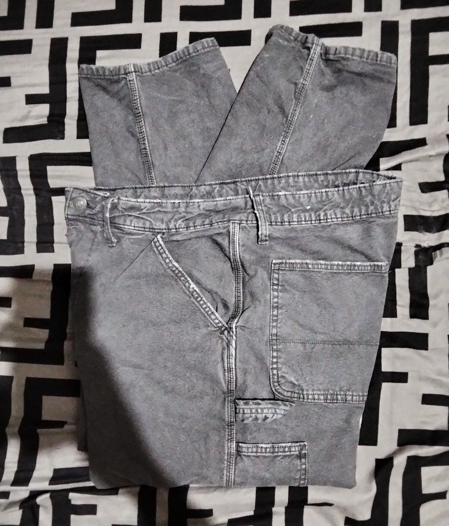 American Eagle Grey Acid Wash Cargo Utility Pants (Category: Activewear) located in Quezon City. Submitted by kemjhon (Listing ID 1469962848, Image 2). Description: - Brand: American Eagle - Style: Grey acid wash utility / cargo pants - Fit: Relaxed fit through the legs - Details: Multiple pockets, utility loops, contrast stitching, and branded hardware - Condition: Great everyday wear with a rugged workwear vibe - Versatility: Neutral shade that