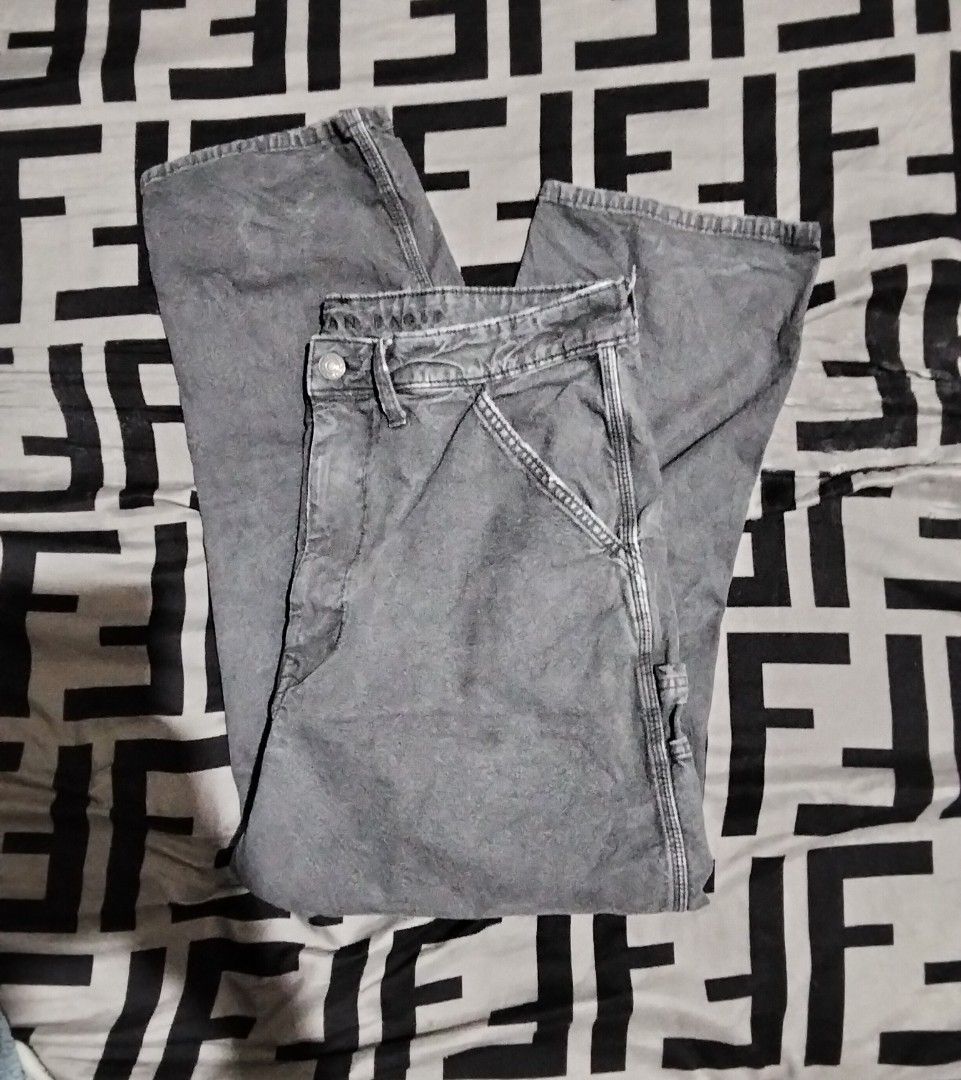 American Eagle Grey Acid Wash Cargo Utility Pants (Category: Activewear) located in Quezon City. Submitted by kemjhon (Listing ID 1469962848, Image 1). Description: - Brand: American Eagle - Style: Grey acid wash utility / cargo pants - Fit: Relaxed fit through the legs - Details: Multiple pockets, utility loops, contrast stitching, and branded hardware - Condition: Great everyday wear with a rugged workwear vibe - Versatility: Neutral shade that