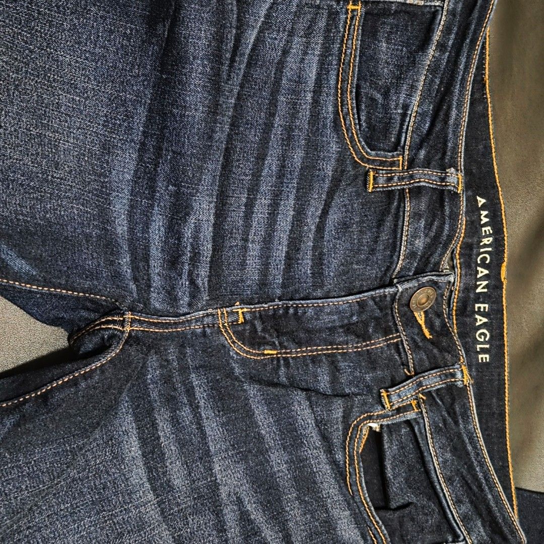 American Eagle Ne(x)t Level Stretch Jeans Size 8 (Category: Jeans) located in Makati City. Submitted by lexshie (Listing ID 1469975154, Image 2). Description: - Brand: American Eagle Outfitters - Size: 8 regular fit - Wash: Dark wash denim - Fabric: Ne(x)t Level Stretch for extra flexibility and all-day comfort - Design: Classic five-pocket styling with contrast stitching and branded button closure.