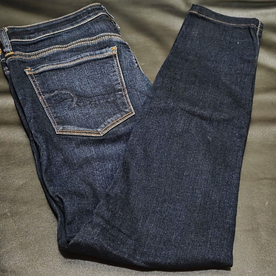 American Eagle Ne(x)t Level Stretch Jeans Size 8 (Category: Jeans) located in Makati City. Submitted by lexshie (Listing ID 1469975154, Image 1). Description: - Brand: American Eagle Outfitters - Size: 8 regular fit - Wash: Dark wash denim - Fabric: Ne(x)t Level Stretch for extra flexibility and all-day comfort - Design: Classic five-pocket styling with contrast stitching and branded button closure.