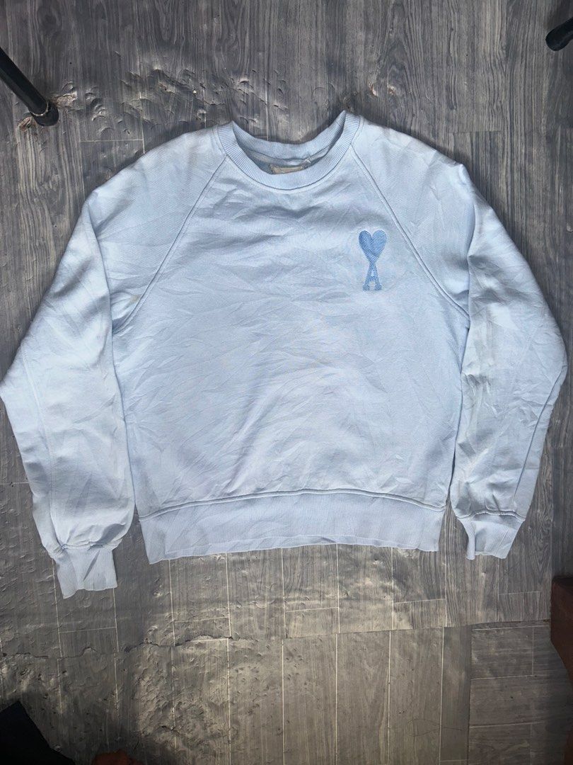 Ami Paris Light Blue Embroidered Heart Sweatshirt (Category: Longsleeves) located in Manila. Submitted by copothrift (Listing ID 1469956086, Image 1). Description: Dimes:22x26 Authen!! No issue!!.