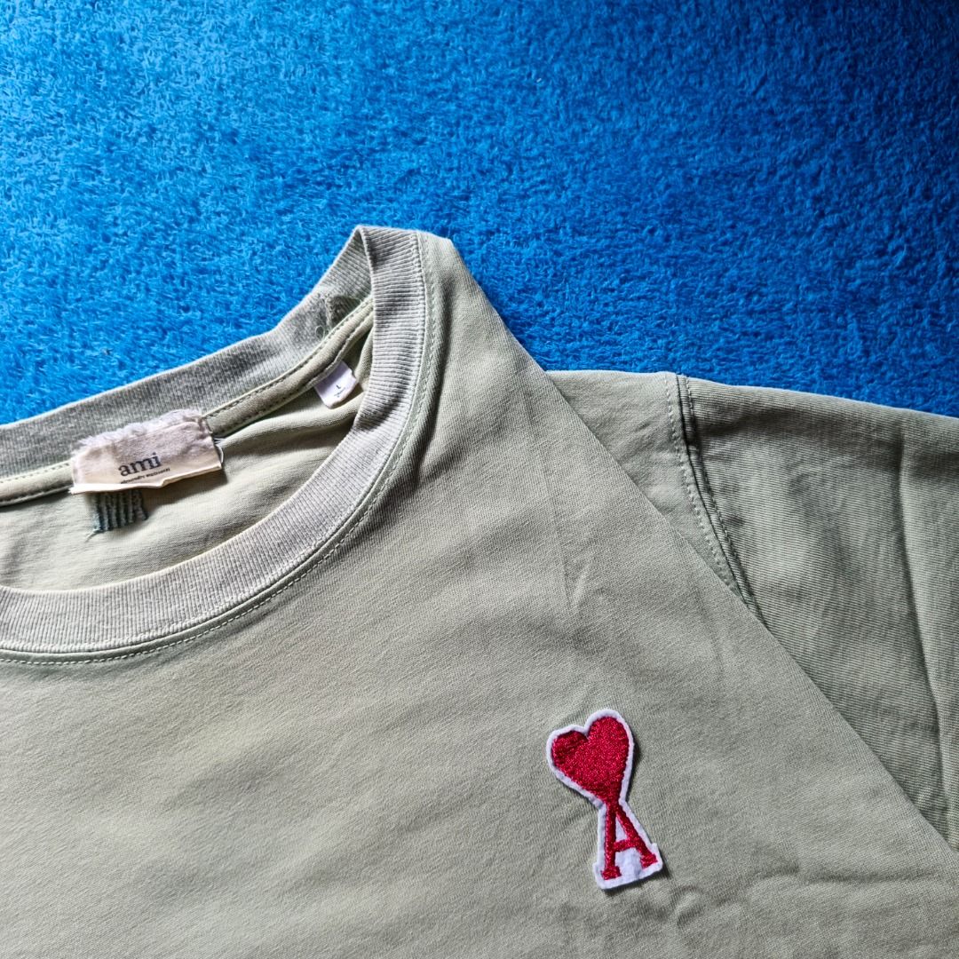 AMI Paris Men Plain T-Shirt (Category: Shirts) located in Antipolo. Submitted by juliane_thrift-declutters (Listing ID 1469986523, Image 2). Description: AMI Paris Men Plain T-Shirt Dimes: 28×22.5 Size: Large on tag Best fit to Large to XL Embroidered Logo • Issue: None (No Pinholes) • Tags: Complete Wash tags • Color rate: 9/10 • Overall Condition: 9.5/10 (Excellent) * Color may vary due to lighting.