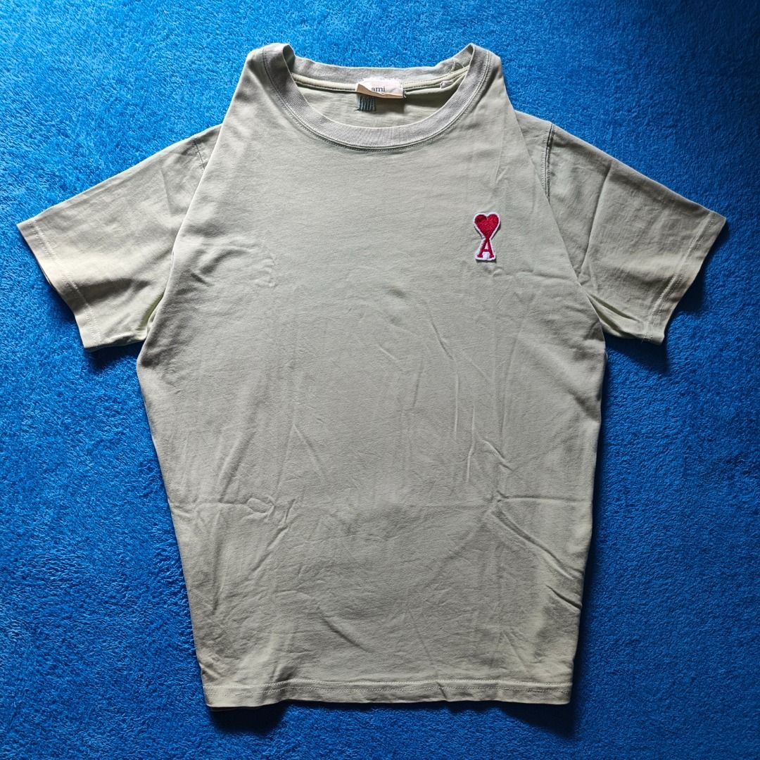 AMI Paris Men Plain T-Shirt (Category: Shirts) located in Antipolo. Submitted by juliane_thrift-declutters (Listing ID 1469986523, Image 1). Description: AMI Paris Men Plain T-Shirt Dimes: 28×22.5 Size: Large on tag Best fit to Large to XL Embroidered Logo • Issue: None (No Pinholes) • Tags: Complete Wash tags • Color rate: 9/10 • Overall Condition: 9.5/10 (Excellent) * Color may vary due to lighting.