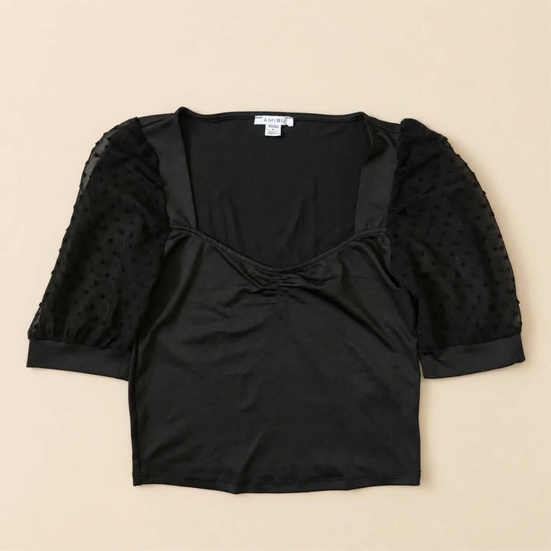 AMISU Black Top with Sheer Polka Dot Sleeves (Category: Blouses) located in Manila. Submitted by joshbelgic17602 (Listing ID 1469970185, Image 1). Description: - Brand: AMISU - Size: M - Color: Classic Black - Design: Square neckline with flattering front ruched detail - Sleeves: Half-length sheer sleeves with a cute dotted pattern and solid black cuffs - Fabric: Smooth body fabric for a comfortable fit - Versatility: Great basic piece that can e
