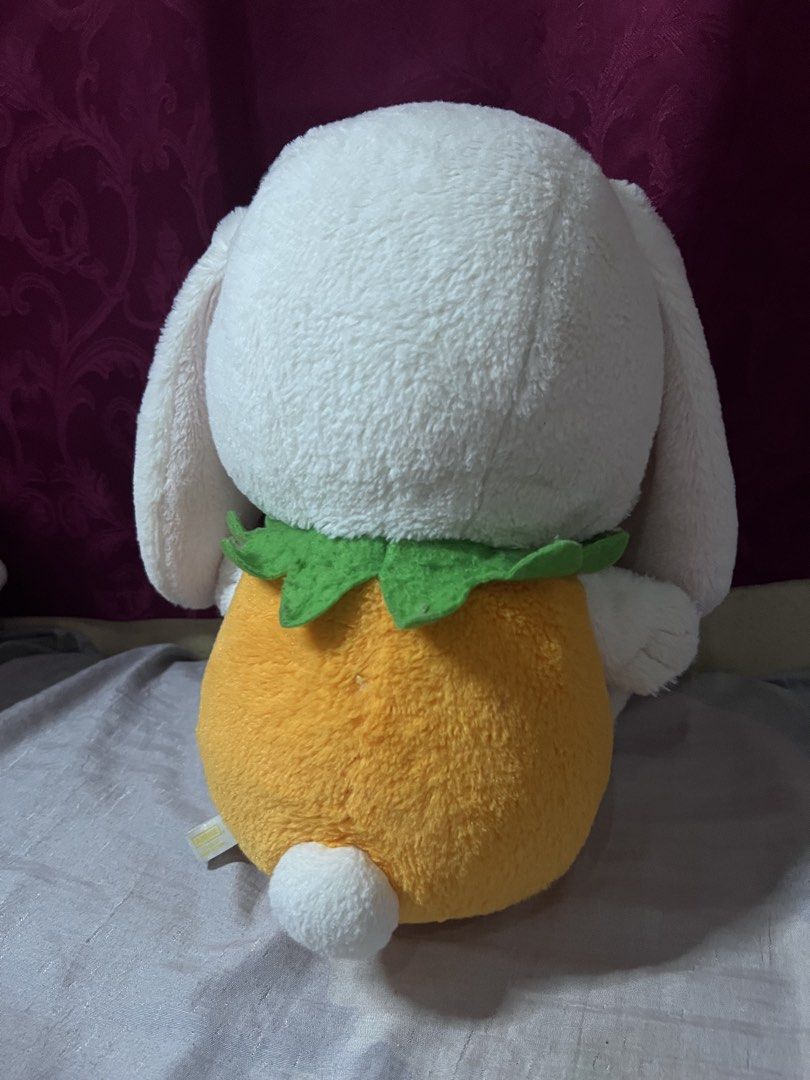 Amuse Halloween Pumpkin Bunny Plush Toy (Category: Plushies & Soft Toys) located in Bulacan. Submitted by haven_plushie_dolls.888 (Listing ID 1470104618, Image 2). Description: Amuse white bunny plush dressed inside a jack-o-lantern pumpkin suit. Black polka dot bow attached to one ear. Green felt collar around the pumpkin opening. Little white tail on the back. Original tag attached at the side seam. Fluffy texture all over. Great collectible pi