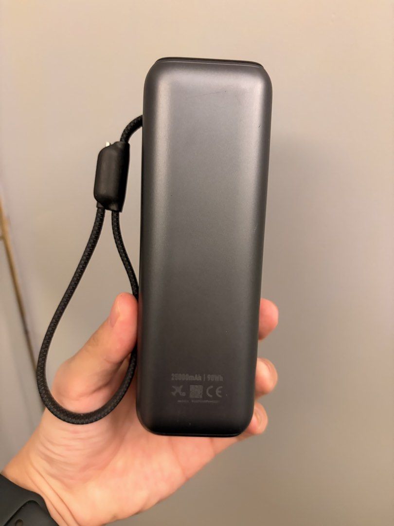 Anker smart power bank 165W (Category: Batteries & Power Banks) located in Makati City. Submitted by jaeclee0 (Listing ID 1470048476, Image 3). Description: - Brand/Model: Anker Smart Power Bank 165W - Capacity: 25000mAh / 90Wh - Color: Dark Grey - Features: Smart digital display showing output per port (C1, C2, C3, A) and battery temperature monitoring - Design: Sleek finish with built-in durable braided strap/cable - Condition: Excellent, well-