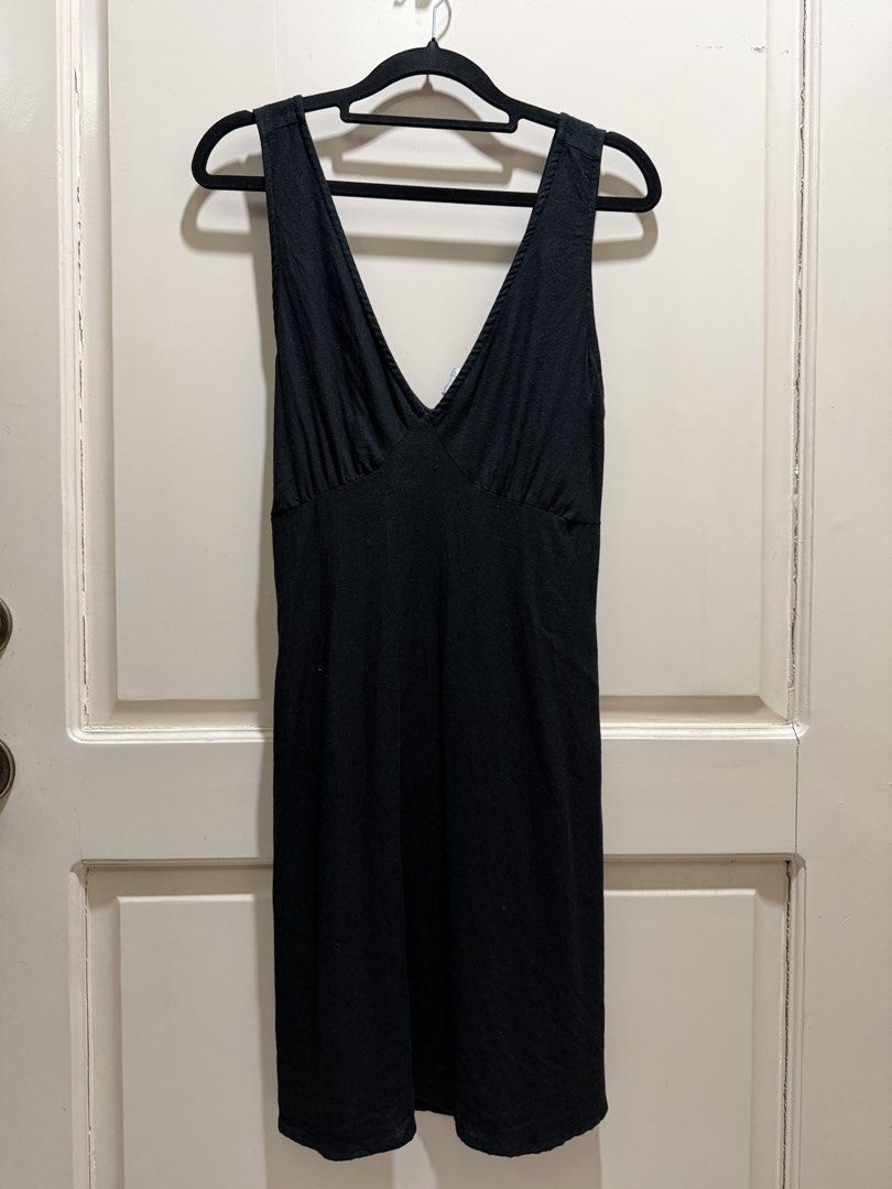 Anko Black V-Neck Mini Dress (Category: Dresses) located in Davao. Submitted by 2ndbase.dvo.ii (Listing ID 1470129150, Image 2). Description: - Brand: Anko - Size: AU/UK 12 (Large) - Color: Classic Black - Style: Mini dress with V-neckline and gathered pleat chest detail - Back: Deep V-back with adjustable waist ties for a custom fit - Closure: Convenient side zipper - Fabric: Lightweight and comfortable for all-day wear.