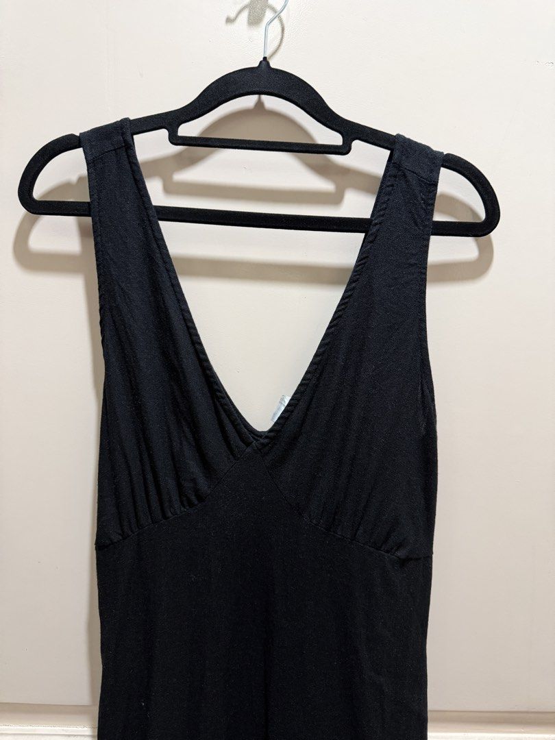 Anko Black V-Neck Mini Dress (Category: Dresses) located in Davao. Submitted by 2ndbase.dvo.ii (Listing ID 1470129150, Image 3). Description: - Brand: Anko - Size: AU/UK 12 (Large) - Color: Classic Black - Style: Mini dress with V-neckline and gathered pleat chest detail - Back: Deep V-back with adjustable waist ties for a custom fit - Closure: Convenient side zipper - Fabric: Lightweight and comfortable for all-day wear.