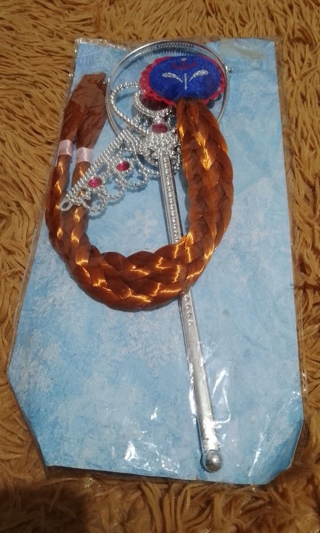 Anna Accessories Crown, Wand And Wig (Category: Babies & Kids Fashion) located in Marikina City. Submitted by alexfortu88925 (Listing ID 1470049442, Image 1). Description: Anna Frozen Crown,Wand And Wig brand new.