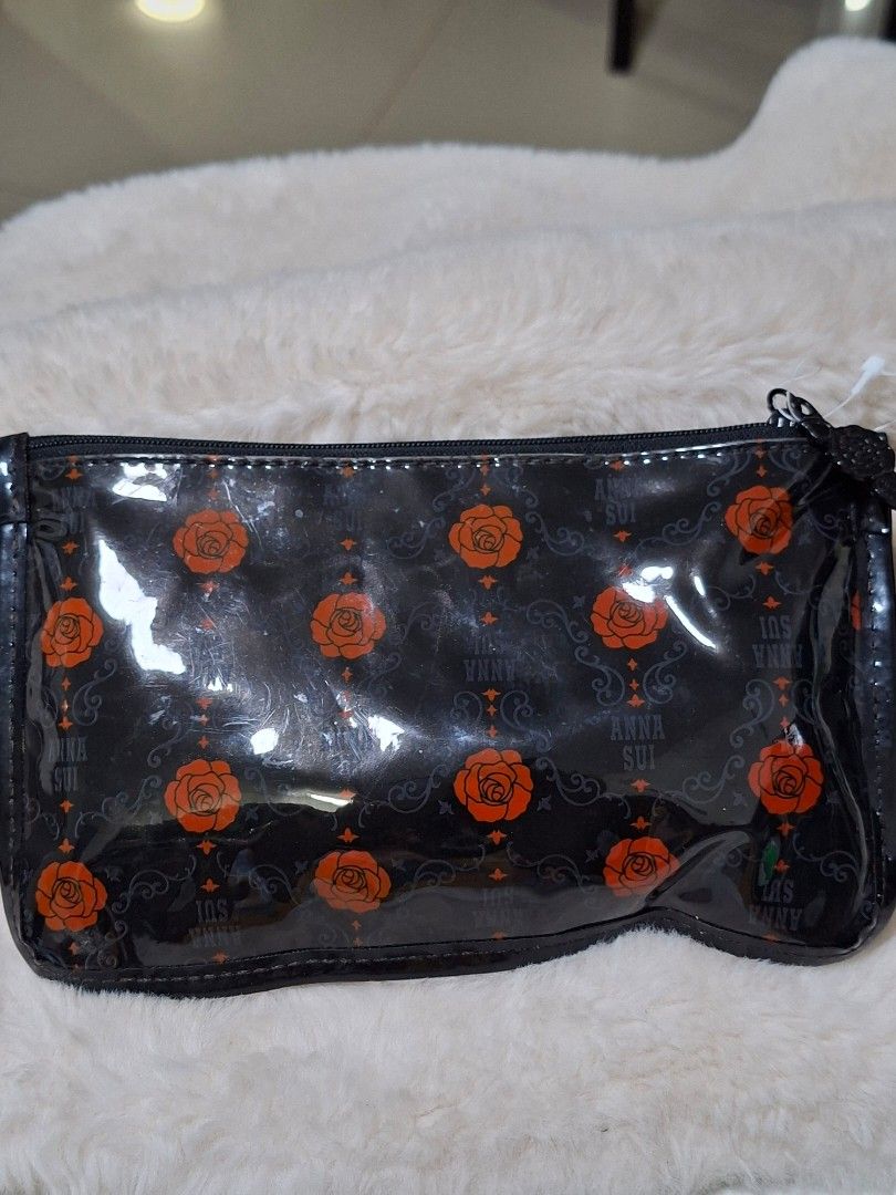 ANNA SUI PVC POUCH (Category: Purses & Pouches) located in Las Pinas. Submitted by annachiaonair2037 (Listing ID 1470126795, Image 3). Description: ANNA SUI PVC POUCH FROM JAPAN NORMAL SIGN OF USAGE Disclaimer: I am not affiliated with, associated with, or authorized by any of the brands featured posted. Any mention of brand names, trademarks, or logos is solely for identification and reference purposes only..