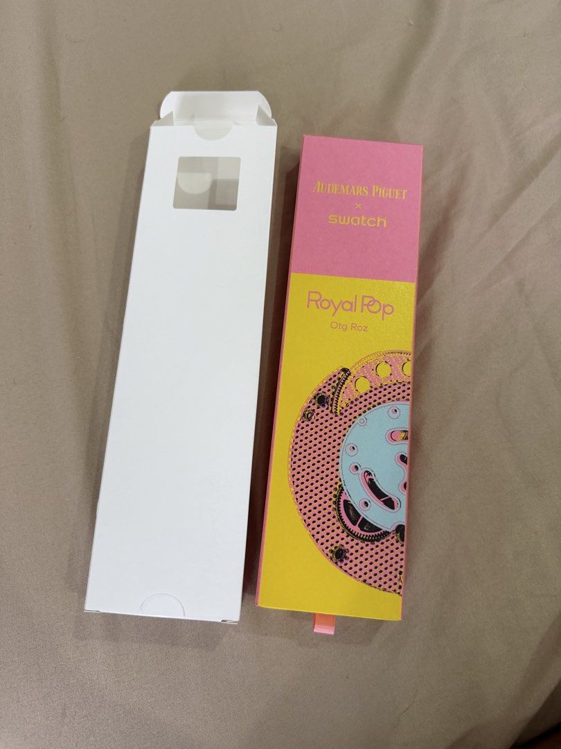 AP x Swatch Royal Pop Otg Roz (Category: Luxury Watches) located in Manila. Submitted by vovochka53 (Listing ID 1470042899, Image 3). Description: - Brand new, unused condition inside original packaging - Audemars Piguet x Swatch Royal Pop in vibrant Otg Roz colourway - Eye-catching bright turquoise textured dial with a bold yellow bezel - Playful pink case and matching strap - Includes special edition pink and yellow presentation box plus white 
