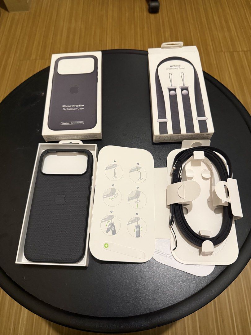 Apple Case for Iphone 17 Promax (Techwoven Case with Crossbody Strap (Category: Cases & Sleeves) located in Las Pinas. Submitted by ricopogi (Listing ID 1470064349, Image 1). Description: - Model: Apple TechWoven Case with Crossbody Strap for iPhone 17 Pro Max (All are original) - Color: Black - Condition: Brand new with original retail boxes - Features: Durable woven texture, MagSafe & Camera Control compatible, adjustable crossbody strap for ha