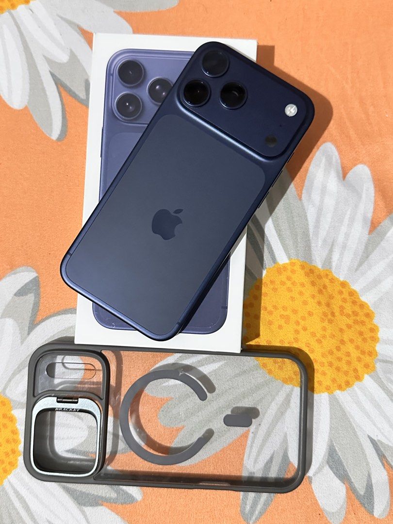 Apple iPhone 17 Pro Max 256GB Deep Blue (Category: iPhone 17 Series) located in Cavite. Submitted by bunnyburrito_ (Listing ID 1470043781, Image 2). Description: - Model: Apple iPhone - Color: Dark Blue - Storage: 256GB - Battery Health: 93% (351 cycle counts) - Status: Factory unlocked / No SIM restrictions - Inclusions: Original retail box and clear protective case with built-in kickstand.