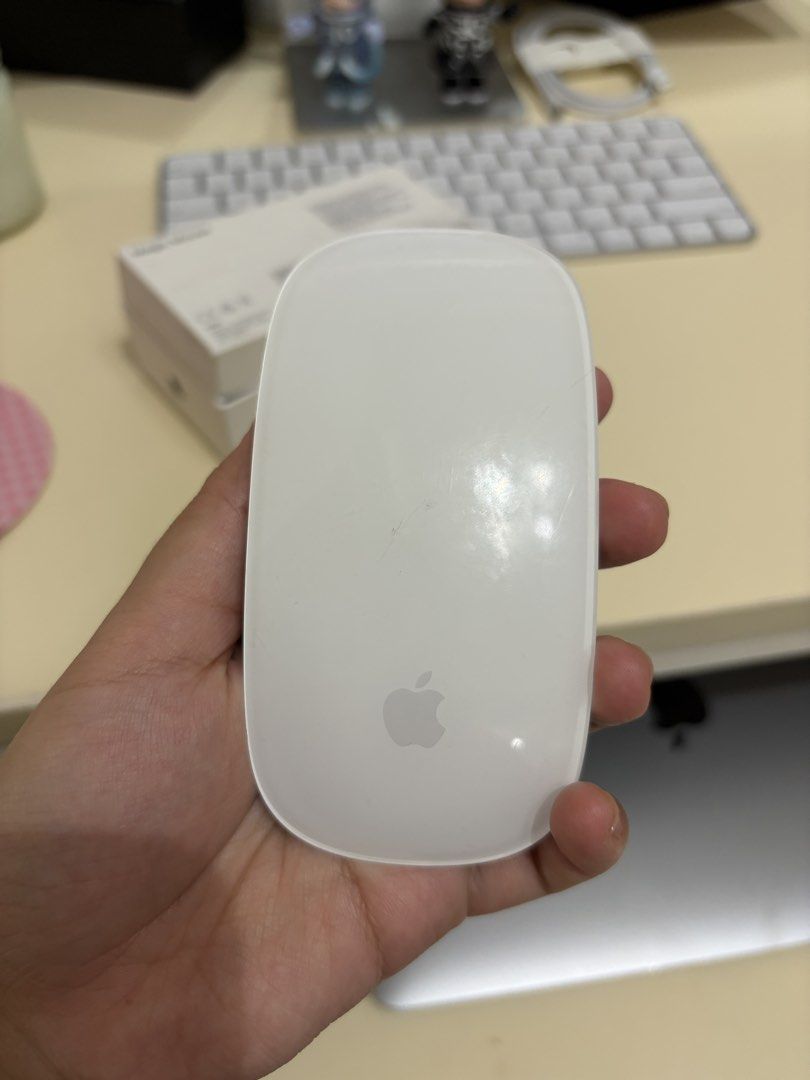 Apple Magic Mouse Model A1657 with Original Box (Category: Mouse & Mousepads) located in Mandaluyong City. Submitted by nuelmanahan007 (Listing ID 1469974813, Image 2). Description: - Bought for ₱2,500+ - See photos for actual condition - Comes with box and receipt.
