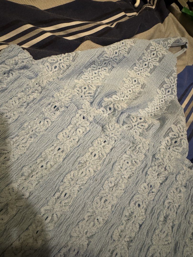 Aralina Light Blue Lace Top (Category: Dresses) located in Manila. Submitted by carmela_andd (Listing ID 1470113388, Image 2). Description: - Brand: Aralina (Designed in Australia) - Condition: Brand new with original store tags - Color: Light blue - Material/Design: Textured crinkled fabric with vertical patterned lace panels - Straps: Adjustable thin shoulder straps.