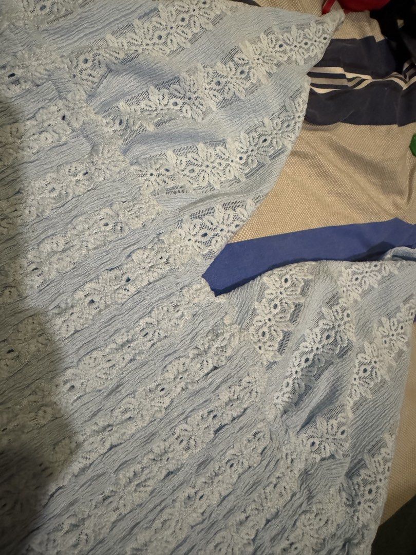 Aralina Light Blue Lace Top (Category: Dresses) located in Manila. Submitted by carmela_andd (Listing ID 1470113388, Image 1). Description: - Brand: Aralina (Designed in Australia) - Condition: Brand new with original store tags - Color: Light blue - Material/Design: Textured crinkled fabric with vertical patterned lace panels - Straps: Adjustable thin shoulder straps.