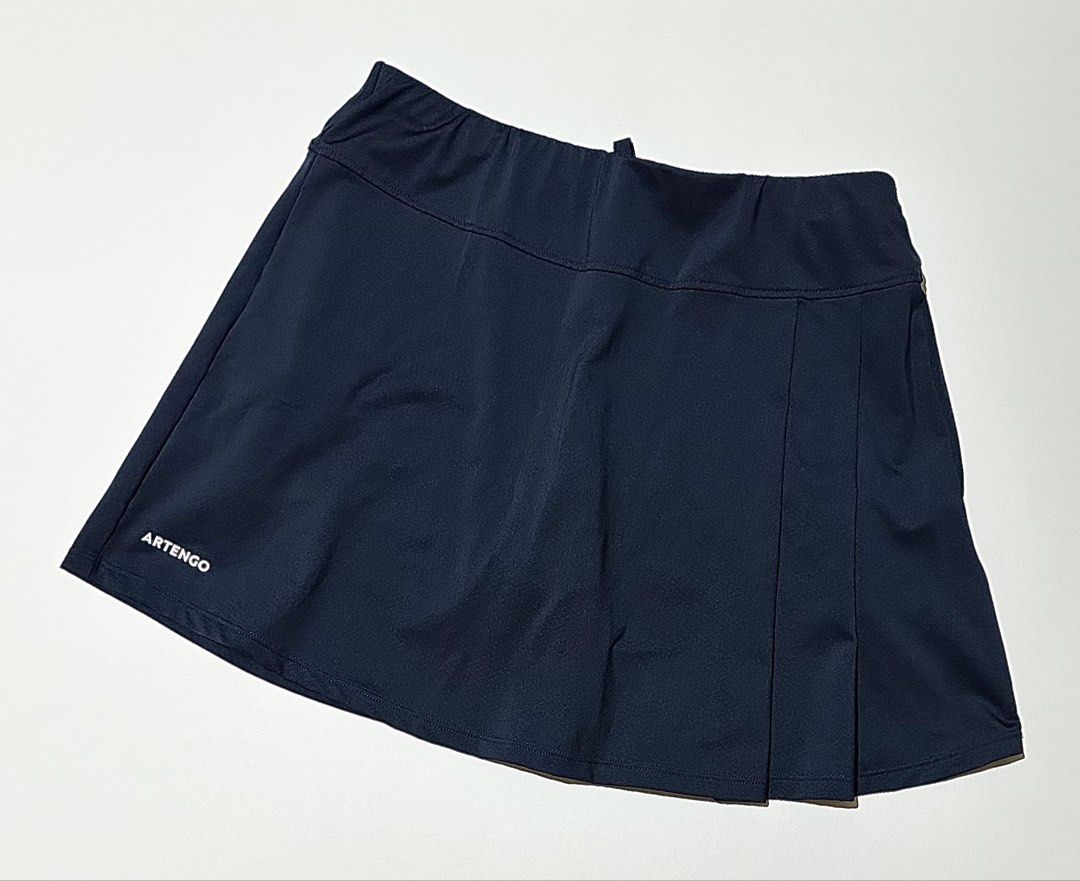 Artengo Tennis Skirt (Category: Activewear) located in Manila. Submitted by reclaimed.shop (Listing ID 1470107260, Image 1). Description: Measurements (laid flat): 📏 Width: 25-32” 📏 Length: 14” 📩 DM us to claim or inquire for more details! Thank you!.