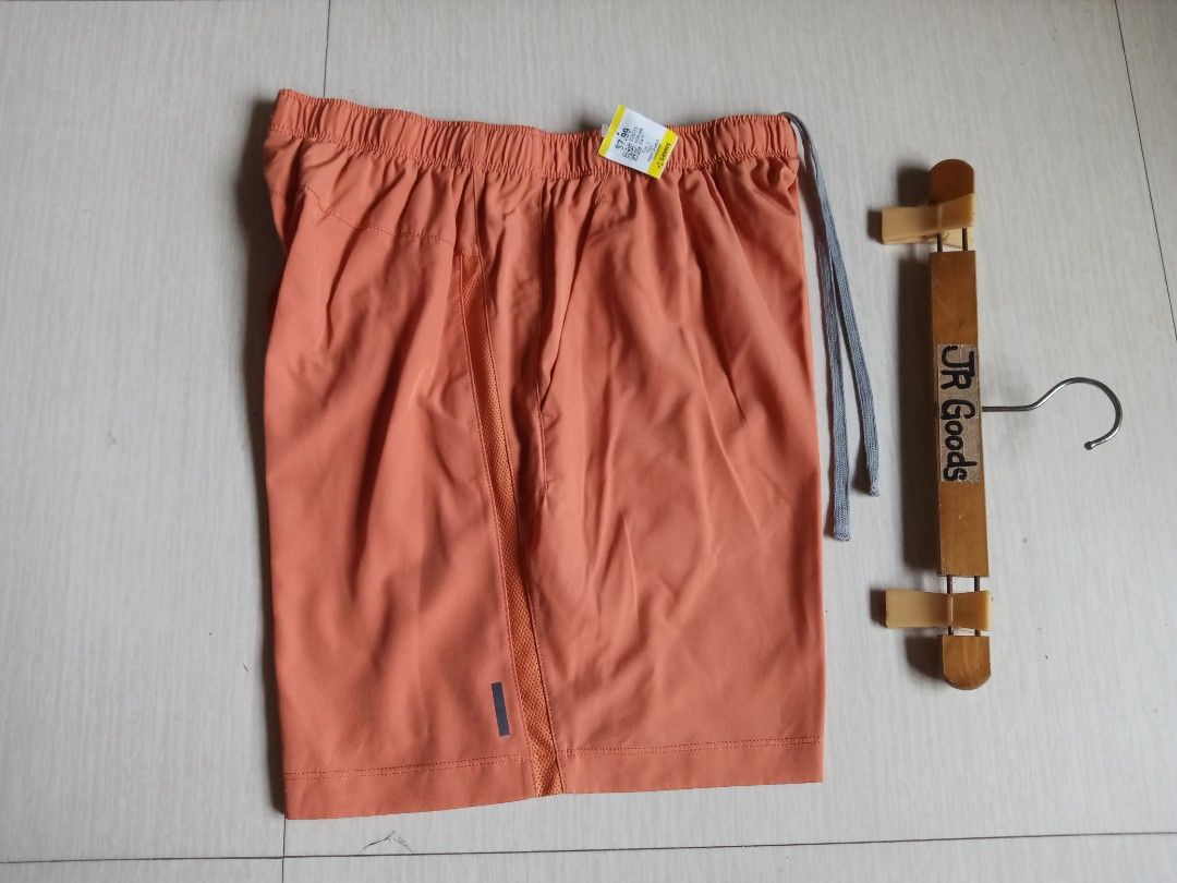 Asics Athletic Running Shorts (Category: Activewear) located in Tanay. Submitted by jrgoods (Listing ID 1469998310, Image 3). Description: Asics running short Best fit medium to large men's above the knee Waistline 30-34 Length 17.5 Good as new condition 599+ship Tanay Rizal location Shipping Nationwide - Color: Vibrant Orange with Grey Drawstring Cords - Material: Main (90% Polyester, 10% Spandex); Inner Insert (80% Polyester, 20% Spandex) - Fea