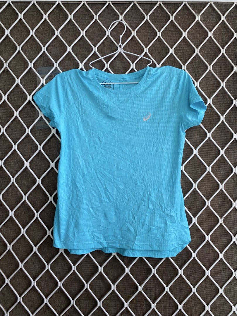Asics Blue Athletic T-Shirt (Category: Activewear) located in Cabadbaran. Submitted by jersey.cobyming (Listing ID 1470053721, Image 1). Description: - Brand/Item: Asics Running T-Shirt - Color: Bright Blue - Size: Medium (M) - Material: 100% Polyester with grid texture - Features: Short sleeves, crew neck, reflective Asics chest logo - Fit: Standard fit, lightweight - Care: Machine washable - Origin: Made in Cambodia.