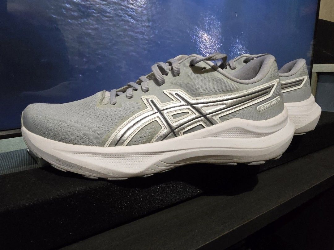 ASICS GT-2000 14 Grey Silver Running Shoes (Category: Activewear) located in Caloocan City. Submitted by billysr (Listing ID 1470009681, Image 1). Description: Bought for a little over 9,000php this year, selling for 6,000php. Slightly negotiable but won't reply to lowballers. RFS - trimming down shoe rotation Shoe milage - 71.4km Meetup only at SM Grand Central - Model: ASICS GT-2000 14 running shoes - SIze: 9.5US mens - Cushioning: FF Blast Max