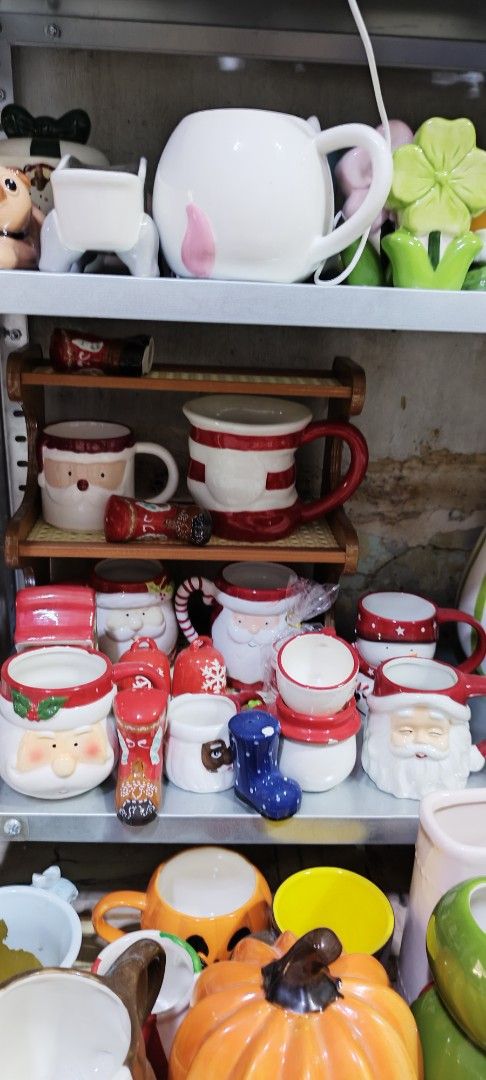 Assorted Christmas Santa and Holiday Ceramic Mugs (Category: Coffee & Tea Tableware) located in Manila. Submitted by silverwhale_cafa21 (Listing ID 1470138313, Image 1). Description: 📌📌Price starts at P100 - Collection: Holiday-themed ceramic mugs and small decor pieces - Design: Features hand-painted Santa faces, striped boots, and festive patterns - Perfect for: Seasonal holiday parties or cozy December mornings - Flexibility: Available to bu