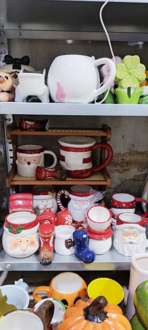 Assorted Christmas Santa and Holiday Ceramic Mugs (Category: Coffee & Tea Tableware) located in Manila. Submitted by silverwhale_cafa21 (Listing ID 1470138313, Image 2). Description: 📌📌Price starts at P100 - Collection: Holiday-themed ceramic mugs and small decor pieces - Design: Features hand-painted Santa faces, striped boots, and festive patterns - Perfect for: Seasonal holiday parties or cozy December mornings - Flexibility: Available to bu