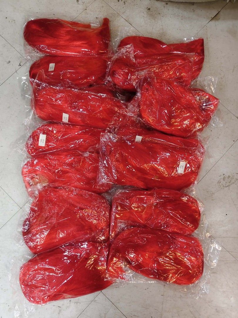 Assorted colorful synthetic wigs in sealed plastic packaging (Category: Hair Accessories) located in Manila. Submitted by neojamesca55018 (Listing ID 1470003687, Image 2). Description: - Colors available: Bright red, blonde, pink, and dark red - Condition: Brand new, smooth fibers, ready to style - Packaging: Each wig is individually packed in a clear plastic bag with label tags - Ideal for: Cosplay, dress-up, parties, and costume events - Stock: