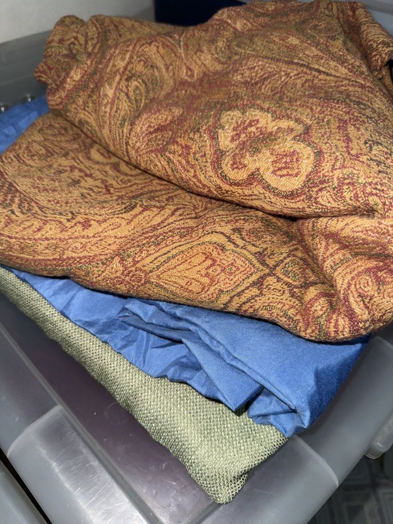 8pcs Assorted quality fabrics ( Mantle, beddings ) (Category: Craft Supplies & Tools) located in Mandaluyong City. Submitted by jeyviee (Listing ID 1470044364, Image 3). Description: - Assorted fabric bundle in blue, yellow, green, red, and various patterns - Includes textiles neatly folded and stored in a blue bag and plastic containers - Ideal for sewing projects, crafts, and DIY upholstery - Selling everything together as a complete set - Rush
