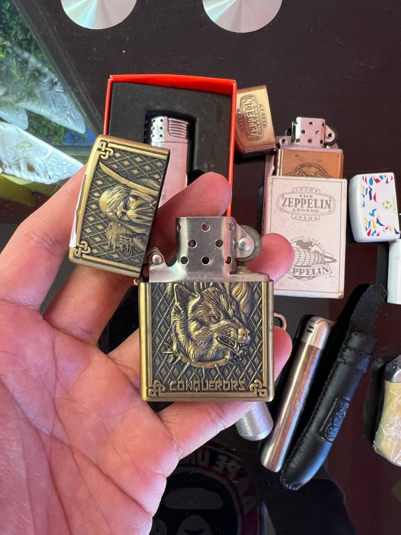 Assorted Lighters Zippo Davidoff Budweiser Carlsberg Zeppelin (Category: Vintage Collectibles) located in Baguio. Submitted by carlbenta (Listing ID 1470081928, Image 3). Description: - Curated collection of lighters and accessories including Zippo models, Davidoff, Carlsberg, Budweiser, and Zeppelin boxed sets - Features diverse designs such as brass wolf engravings, chrome finishes, and promotional beer branding - Includes practical extras like