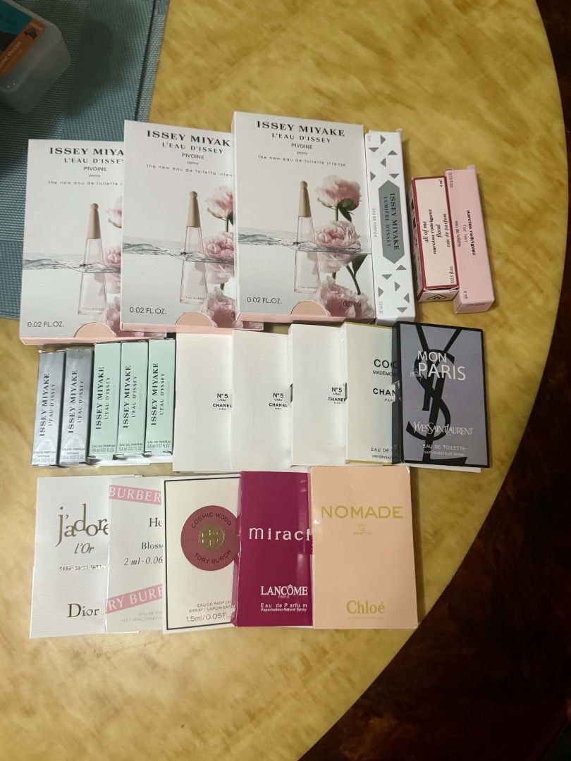 Assorted Luxury Perfume Sample Vials and Miniatures from Singapore (Category: Fragrance & Deodorants) located in Tarlac. Submitted by alleiz1521 (Listing ID 1469967579, Image 3). Description: - Authentic designer perfume samples and travel miniatures - Brands included: Chanel, Dior, Yves Saint Laurent, Issey Miyake, Burberry, Tory Burch, Lancome, and Chloe - Scents include J'adore l'Or, Mon Paris, Nomade, Miracle, and No. 5 - Condition: All items