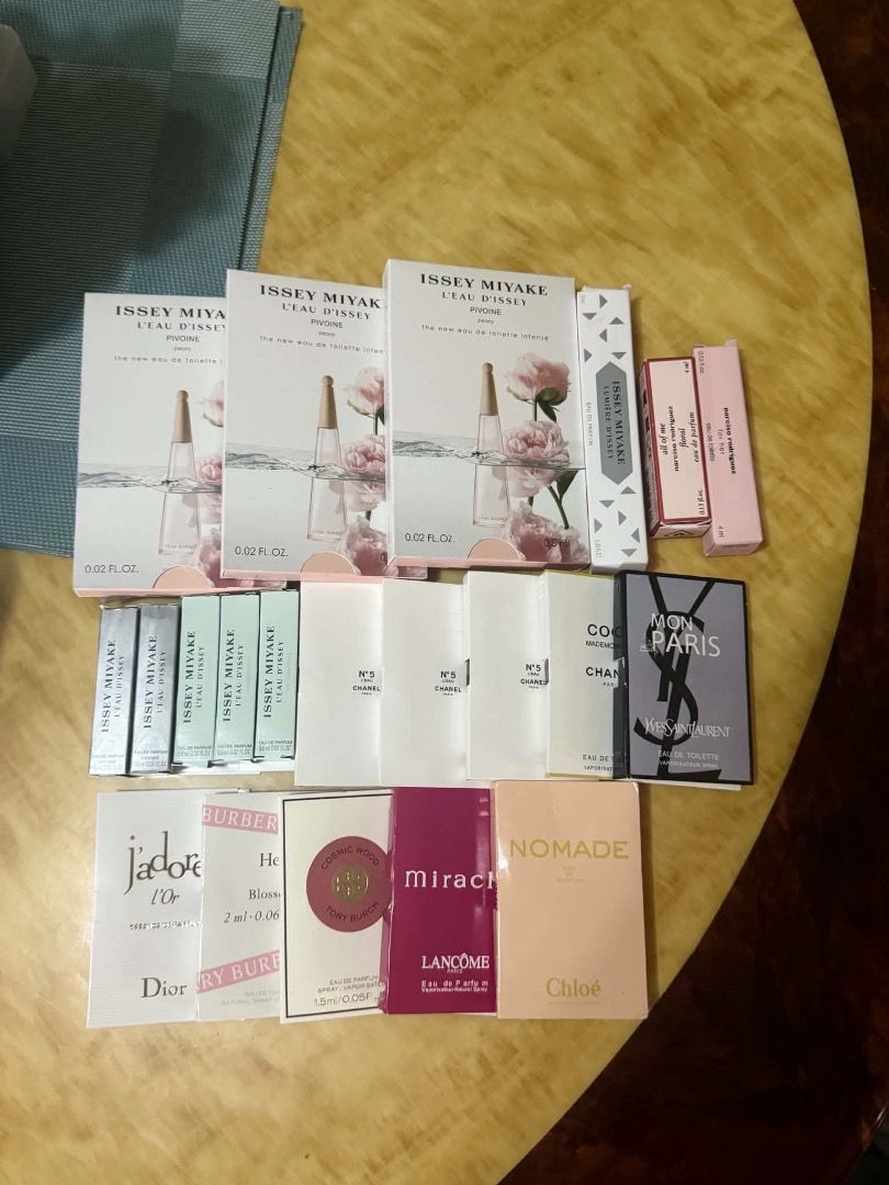 Assorted Luxury Perfume Sample Vials and Miniatures from Singapore (Category: Fragrance & Deodorants) located in Tarlac. Submitted by alleiz1521 (Listing ID 1469967579, Image 2). Description: - Authentic designer perfume samples and travel miniatures - Brands included: Chanel, Dior, Yves Saint Laurent, Issey Miyake, Burberry, Tory Burch, Lancome, and Chloe - Scents include J'adore l'Or, Mon Paris, Nomade, Miracle, and No. 5 - Condition: All items