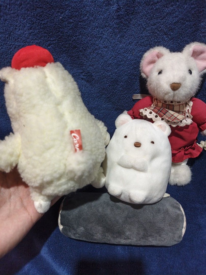 Assorted Plush Toys Bundle Alpaca Cat Mouse Sumikkogurashi (Category: Plushies & Soft Toys) located in Manila. Submitted by kirstentoyshub (Listing ID 1470016410, Image 3). Description: - Lot of 5 cute plush toys and a bolster pillow - Includes: Gold cat head, white alpaca with Hiroshima Carp cap, white mouse in plaid-trim red dress, small white polar bear, and grey cylindrical bolster - Features various brands and tags (including Carp and S.W.D 