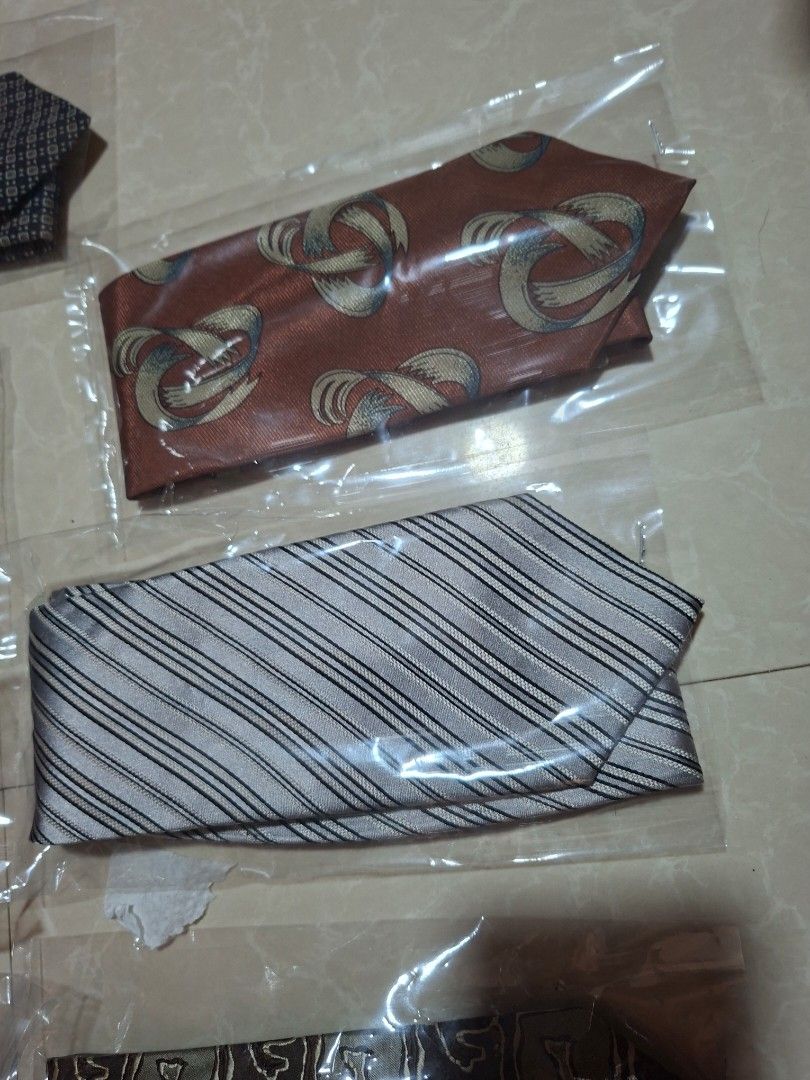 Assorted Vintage Neckties Collection Lot (Category: Ties) located in Bulacan. Submitted by ourdailyfinds (Listing ID 1469963029, Image 3). Description: Gentlemen's Vintage & Classic Neckties Collection Elevate your office attire, business meetings, or fellowship night outfits with this curated collection of premium gentlemen's neckties. Featuring a timeless mix of regimental stripes, sophisticated geometric repeats, and vintage abstract patterns,