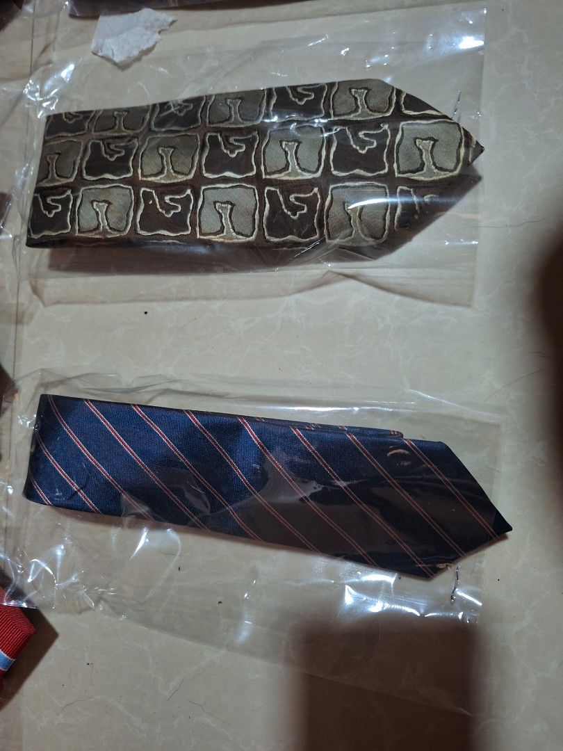 Assorted Vintage Neckties Collection Lot (Category: Ties) located in Bulacan. Submitted by ourdailyfinds (Listing ID 1469963029, Image 2). Description: Gentlemen's Vintage & Classic Neckties Collection Elevate your office attire, business meetings, or fellowship night outfits with this curated collection of premium gentlemen's neckties. Featuring a timeless mix of regimental stripes, sophisticated geometric repeats, and vintage abstract patterns,