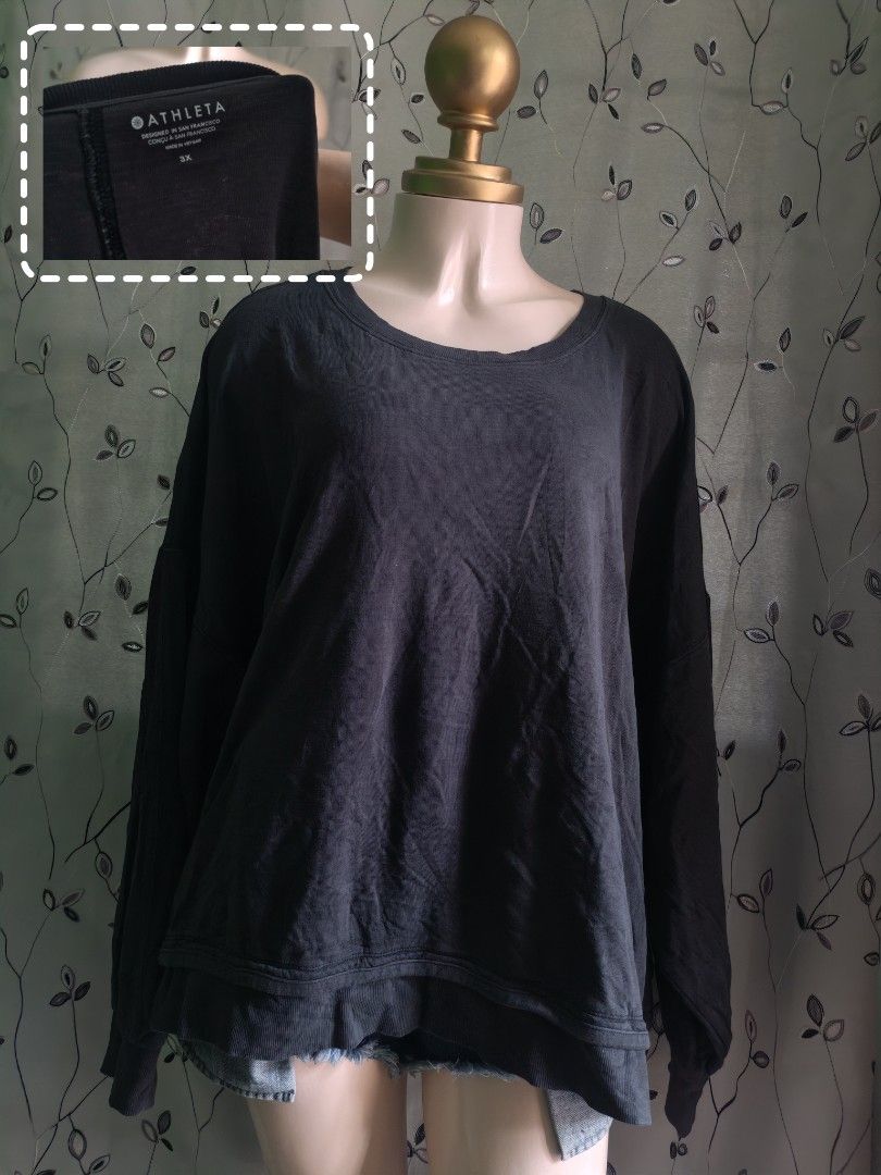Athleta Black Long Sleeve Sweatshirt Size 3X (Category: Longsleeves) located in Caloocan City. Submitted by _misskaye (Listing ID 1470062541, Image 1). Description: - Brand: Athleta - Size: 3X (Plus Size) - Color: Classic Black - Fit: Relaxed fit with drop shoulders - Neckline: Wide scoop neck - Details: Long sleeves and ribbed trim along the hem - Material: Soft, cozy fabric - Style: Casual everyday top, perfect for lounging or running errands.