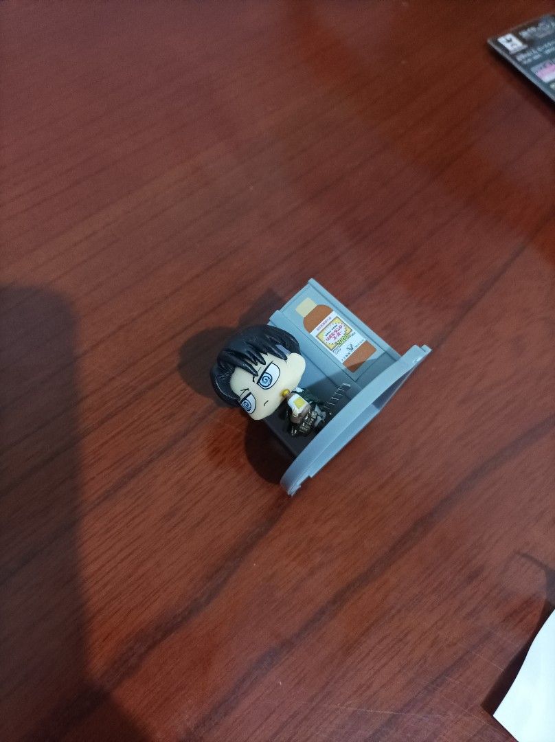 Attack on Titan Levi Ackerman pen holder (Category: Figurines & Statues) located in Bacoor. Submitted by kuroochiii94695 (Listing ID 1469994827, Image 1). Description: - Character: Levi Ackerman (Attack on Titan) - Version: Miniature figure with dizzy eyes expression and cleaner bucket base - Condition: Loose, well-maintained with a clean paint job (no original packaging) - Size: Compact, perfect for desk display - Ideal for: Attack on Titan coll