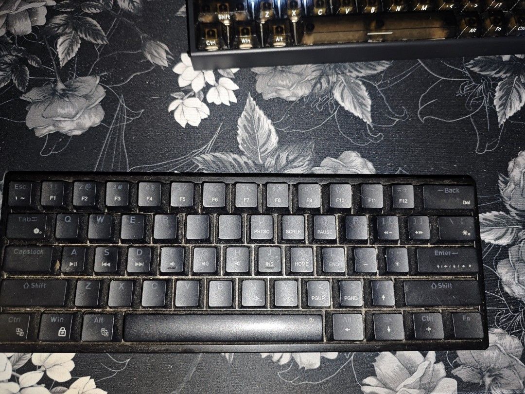 Aula 61 keys Wired Mechanical Keyboard (Category: Computer Keyboard) located in Navotas City. Submitted by bseju (Listing ID 1470132266, Image 2). Description: - Model: AULA F3261 Mechanical Keyboard (Black) - Layout: Compact 61-key space-saving design - Switches: Hotswappable red switches for smooth typing and gaming - Lighting: Vibrant RGB backlighting - Connectivity: Wired USB connection - Condition: Fully functional, minor dust on keycaps fro
