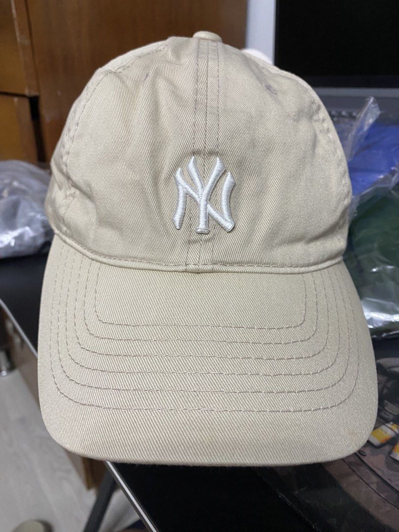 Authentic 2019 MLB Korea CP77 Ball Cap (Category: Caps & Hats) located in Quezon City. Submitted by freshfitsbyja (Listing ID 1470097094, Image 1). Description: MLB New York Yankees Beige Baseball Cap Color Rate: 10/10 Condition: Good - Excellent Minor Stitching Flaw (See Last Pic).