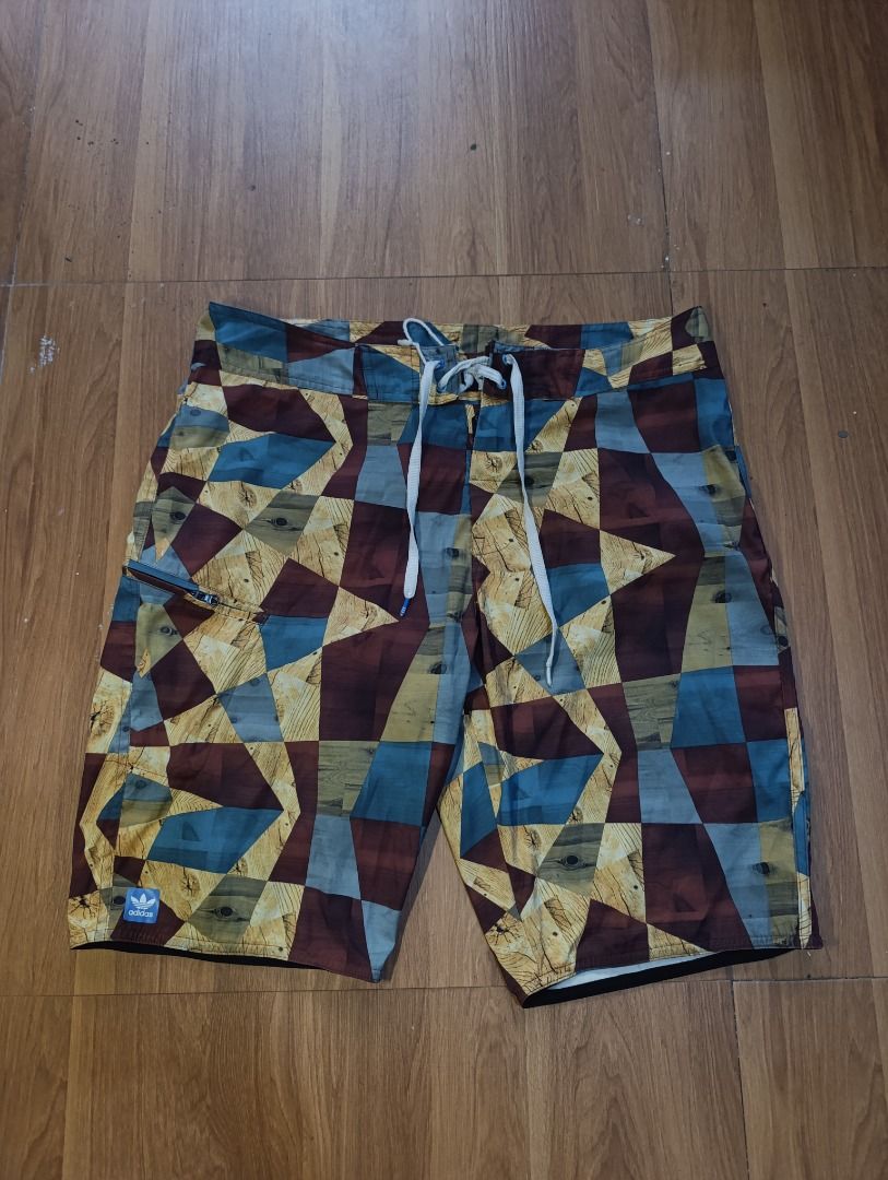 Authentic Adidas Geometric Board Short / Swim Trunk (Category: Shorts) located in Bulacan. Submitted by koritoo (Listing ID 1470012528, Image 1). Description: Authentic Adidas Geometric Board Short / Swim Trunk Good as new no issue Size XL Dimensions: 36 Width 21 Length 10 Hem Color rate: 10/10.