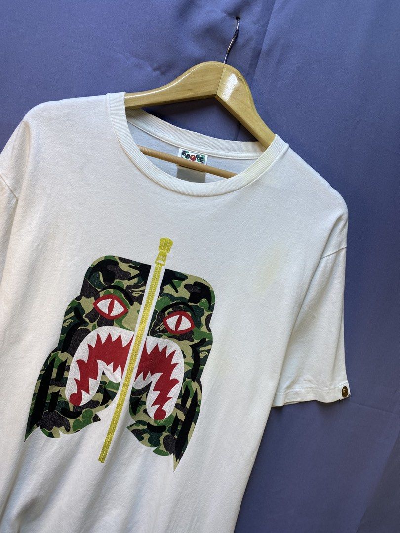 AUTHENTIC BAPE FUNTHERA (Category: Tshirts & Polo Shirts ) located in Makati City. Submitted by drip.poww (Listing ID 1470096781, Image 3). Description: - Authentic Bape - Color: White - Size: XL - Dimes: 24x29 - Authentic - Hairlines - Need wash, fresh from bale - Material: 100% Cotton Please don’t expect too much—these are thrifted (ukay) items. 😊 !!STILL NEGOTIABLE!!.