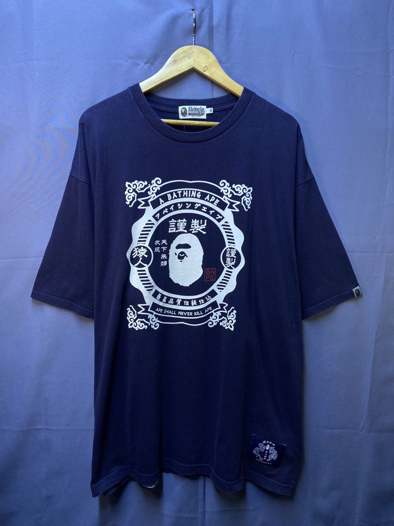 Authentic Bape “Japanesse Motif” Tee (Category: Tshirts & Polo Shirts ) located in Makati City. Submitted by drip.poww (Listing ID 1470097331, Image 1). Description: - Authentic Bape - Color: Navy Blue - Size: 3xl - Dimes: 28x32 - Authentic - Excellent condition - Need wash, fresh from bale - Material: 100% Cotton Please don’t expect too much—these are thrifted (ukay) items. 😊 !!STILL NEGOTIABLE!!.